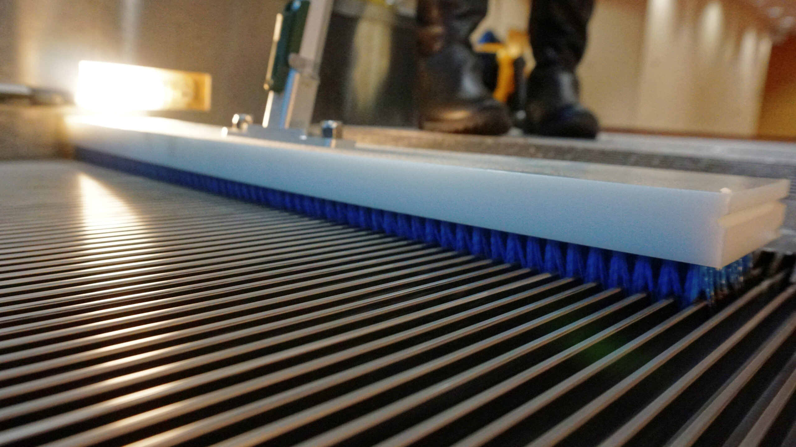 Close up of REN Escalator Tread Deep Cleaning Brush